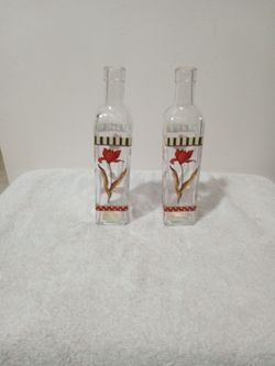 Two Beautiful glass bottles With Flowers On All Sides 