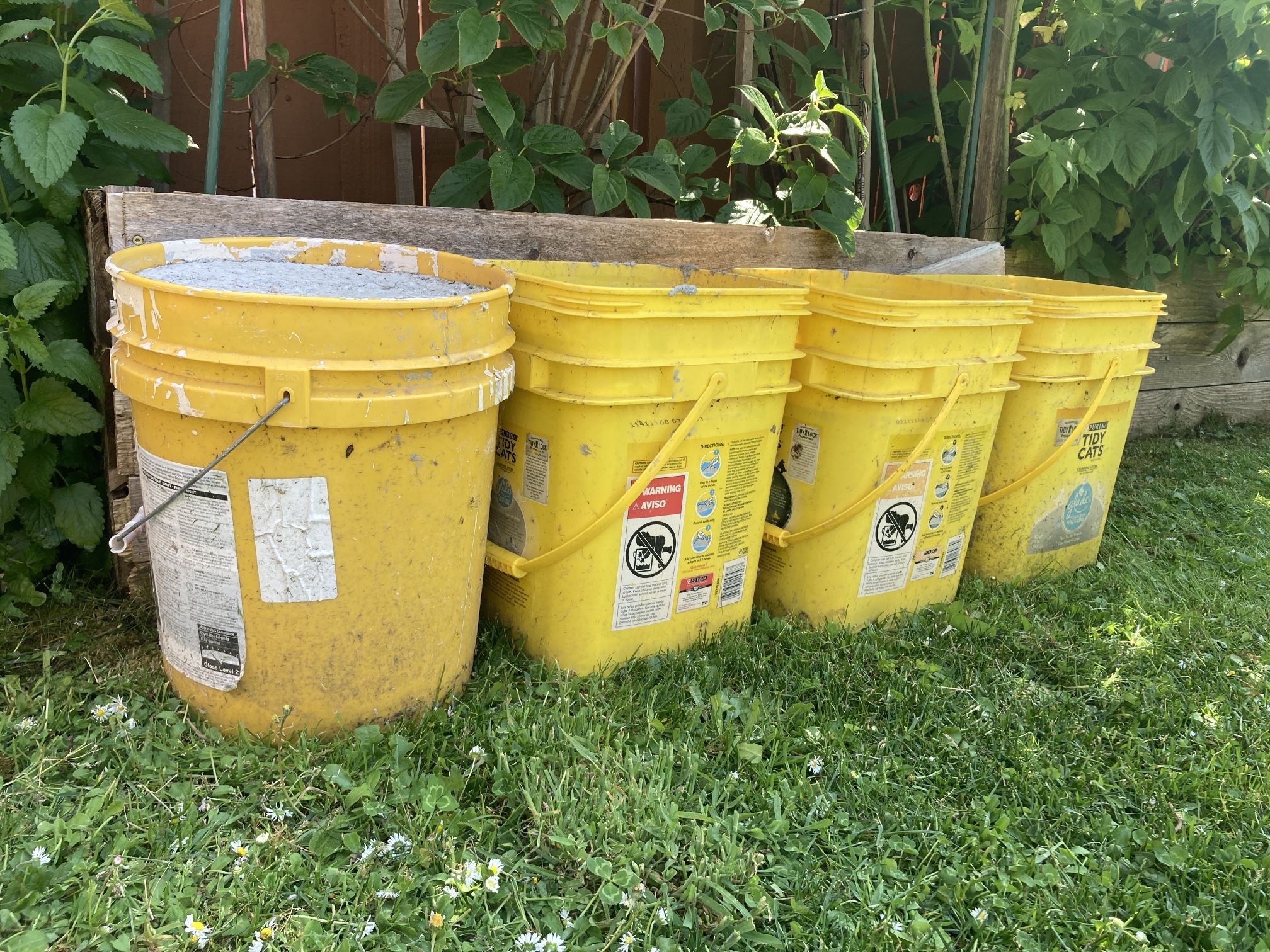 4 Five Gallon Buckets Of Hard Concrete