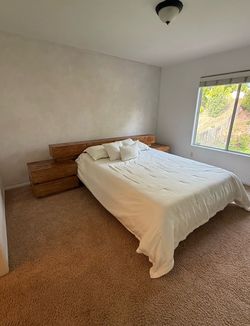 Solid hardwood queen bed frame with matching built-in nightstands