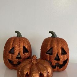 Three sparkle Halloween pumpkins 