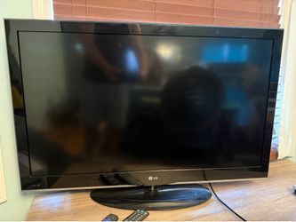 41 Inch Standing LG flatscreen TV & 2 Remotes
