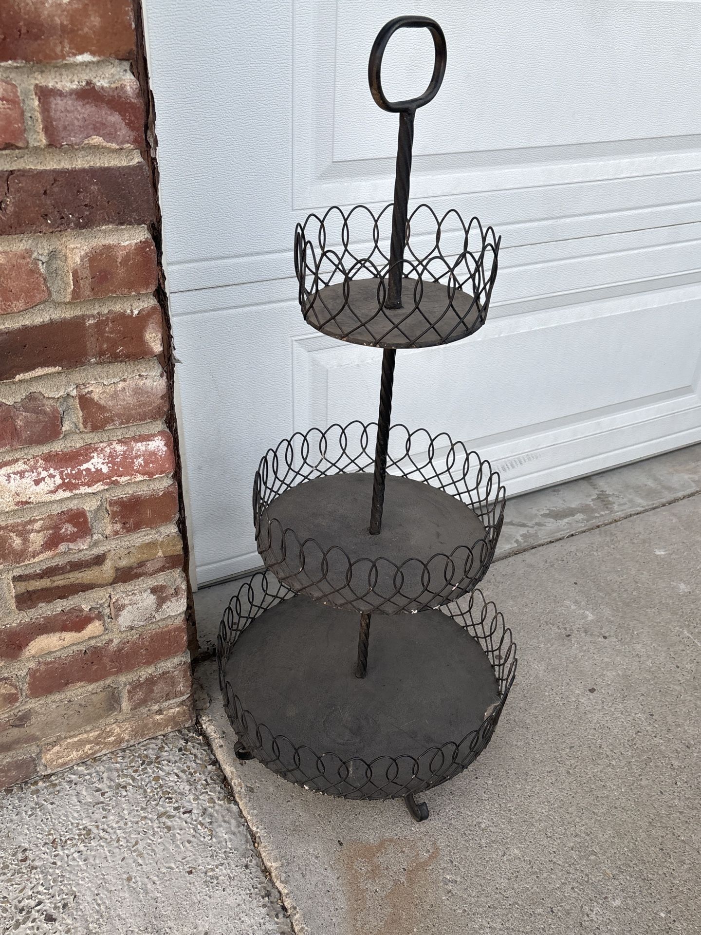 Multi-tiered metal basket stand