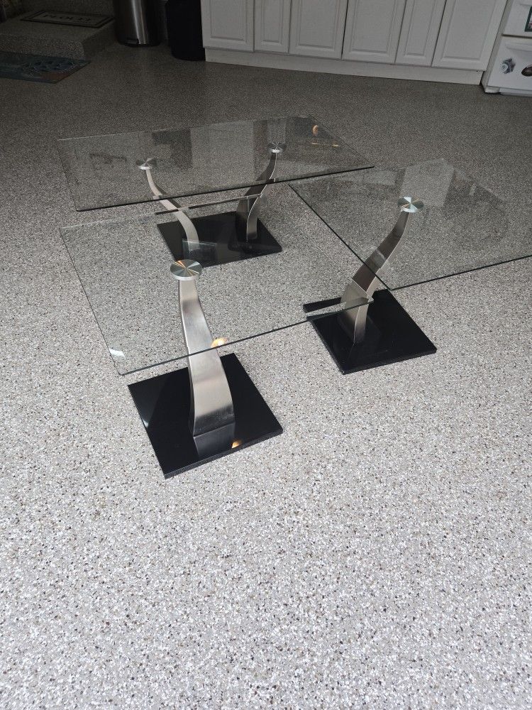 Uses Glass coffee table and two end tables. 3 piece set Used Had Some Rust Spots