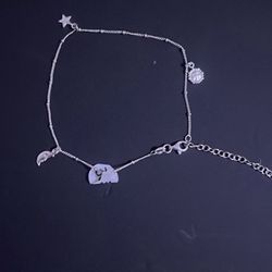 1.7 grams sterling silver 925 anklet/bracelet with charms.