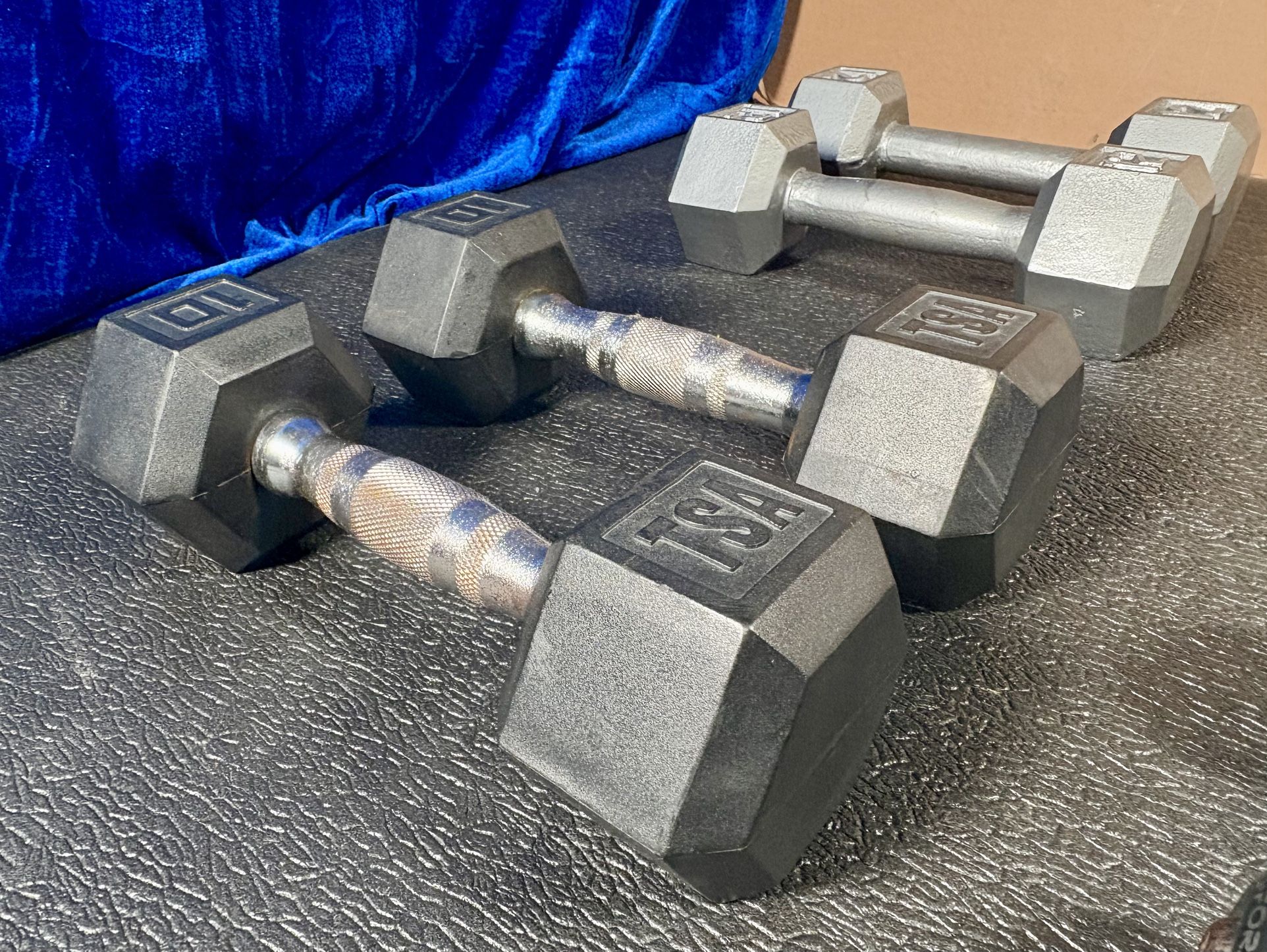 Set of Hex Cast Iron Dumbbells ( light) 12#, 10#, 8# and 5 # In total: 70 pounds.