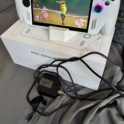 Xbox rog still brand knew comes with everything that came inside the box including
