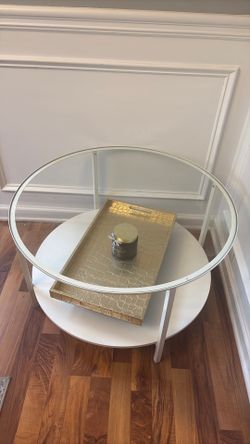 Round glass top coffee table