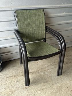 4 green Outdoor patio chairs