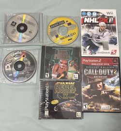 Game lot ps2 call of duty, play station Star Wars, crash bandicoot 3, Cool Boarders 2, Jurassic park Sega CD, Dark Forces PC, NHL Wii