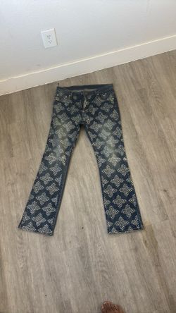 Bedazzled stacked blue jeans