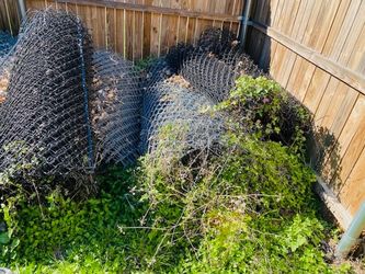 14 BIG ROLL CHAIN LINK WIRE FENCE..ALL GOOD CONDITION. $40  PER ROLL