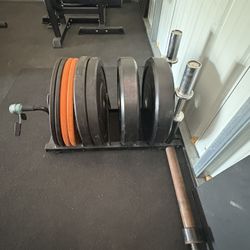 Olympic Barbell, Bumper Plates, Adjustable Bench, Collars, Rubber Mats & FREE…