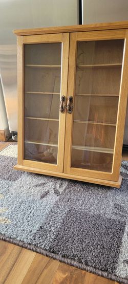 Wood curio cabinet