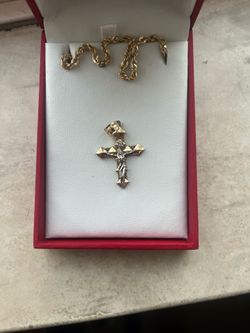 Gold cross pendant
