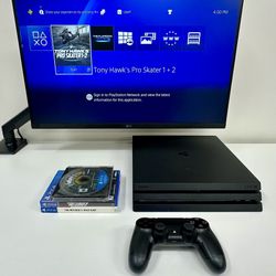 Sony PlayStation 4 Pro (1 Terabyte HardDrive) with games - CUH - 7215B