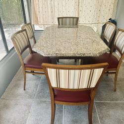Marble and Wooden table With Six  Leather Chairs 