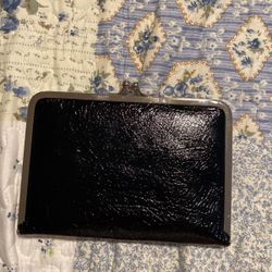 Shinny Black Clutch Wallet With A Clasp Type ClosuThe Top. M