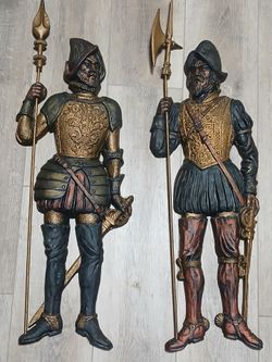 Conquistadors cast iron pair 32"