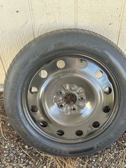 Donut spare 5 lug Ford