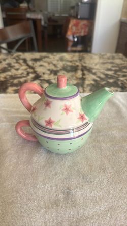 Teapot and cup