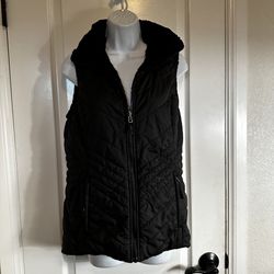 Women’s reversible black The North face vest 