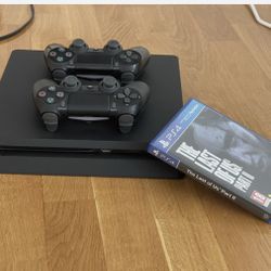 PS4 Slim Jet Black With 4 Games 