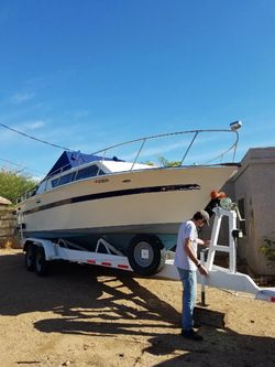 Cabin Cruiser Boat with Trailer