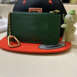 Authentic Louis Vuitton, green leather coin keychain