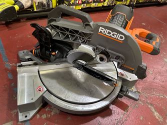 Used Ridgid dual bevel miter saw $130 missing center piece and blade