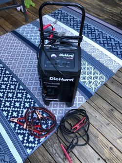 Battery charger W/ 2 sets of jumper cables