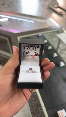 Purple stone on white band