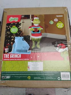 4 ft tall the Grinch animated character Dr Seuss #(contact info removed)