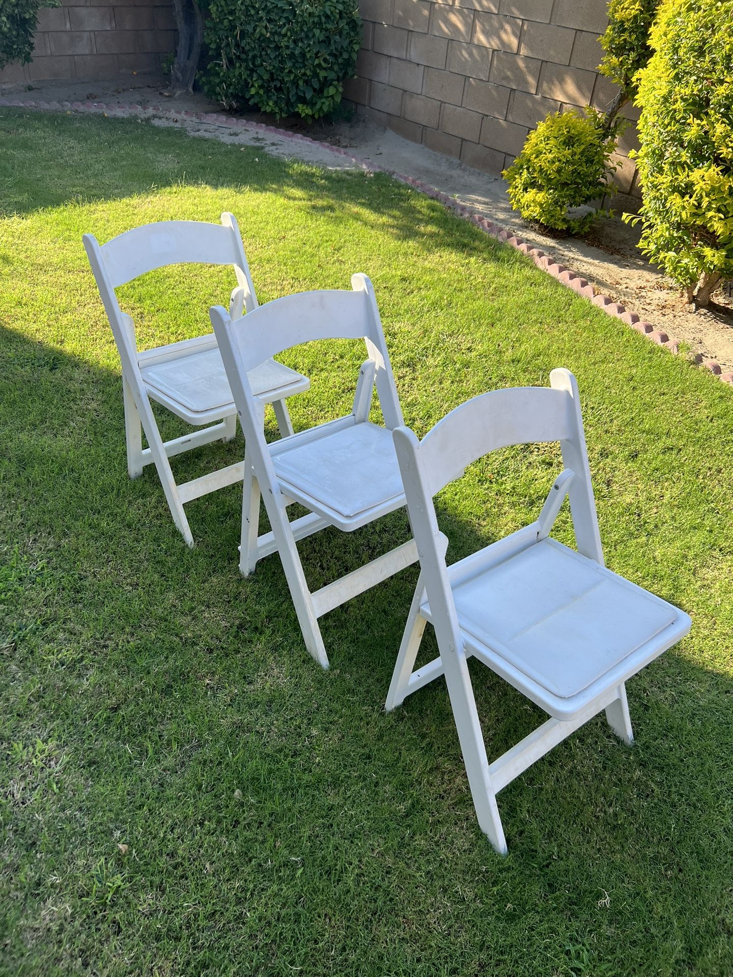 White Padded Resin Foldable Chairs