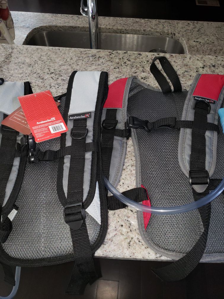 2 Avalanche hydration backpacks never used $20.00 for both