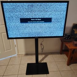 Samsung 55 Inch Flat Screen With Stand.