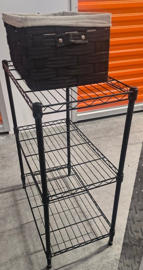 3 Tier Storage Rack And A Black Wicker Storage Container Decoration 