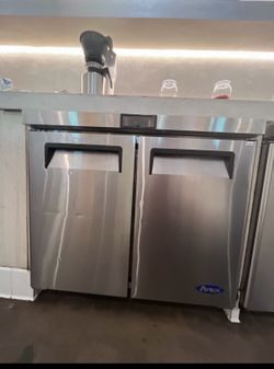 Freezer and refrigerator  piking up downtown after 9pm
