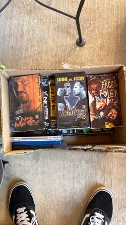 Lot of WWE VHS and WWE magazines