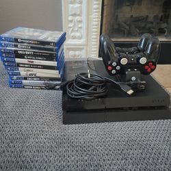 PlayStation, 11 games and 2 controllers with charging station