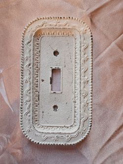 decorative, distressed white light switch plate