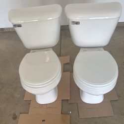 Matching Pair Of Toilets 