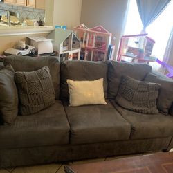 2 Couches (1 Sleeper Sofa) 2 Ottomans, And Big Chair 