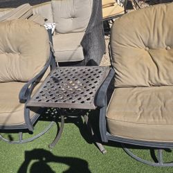 $220  BIG SWIVEL CHAIRS AND TABLE WITH SUNBRELLA CUSHIONS 