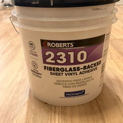 Adhesivo Roberts 2310 – 4 Galones Nuevo, sellado. Para sheet vinyl con respaldo de fibra de vidrio.