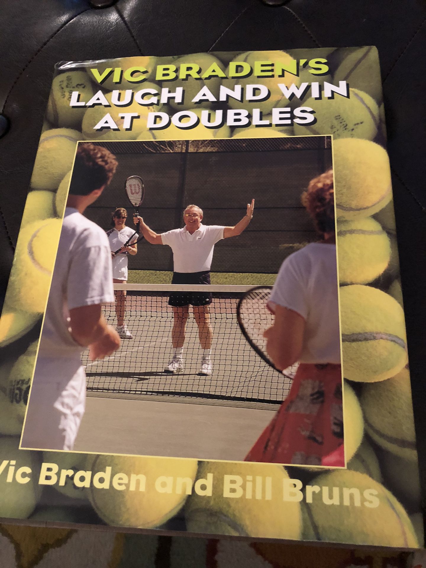Tennis book and picture frame $10 for both. Book is Vic Braden’s LAUGH AND WIN AT DOUBLES