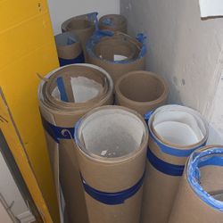 Rolls Of Used And Unused Ram Board Surface / Floor Protector 