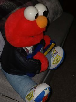 Sesame Street Elmo Plush Toy with guitar rocking elmo