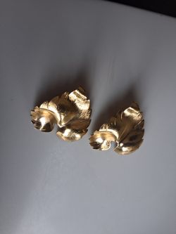 Gold clip on leaf shaped earrings