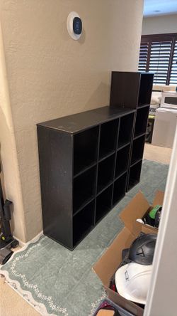 2 black book shelves
