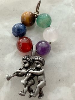 Cherubs playing trumpet Gemini Zodiac Pewter Pendant